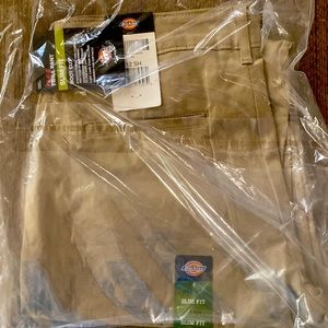 New with tags Dickies slim fit boot cut pants in size 12.